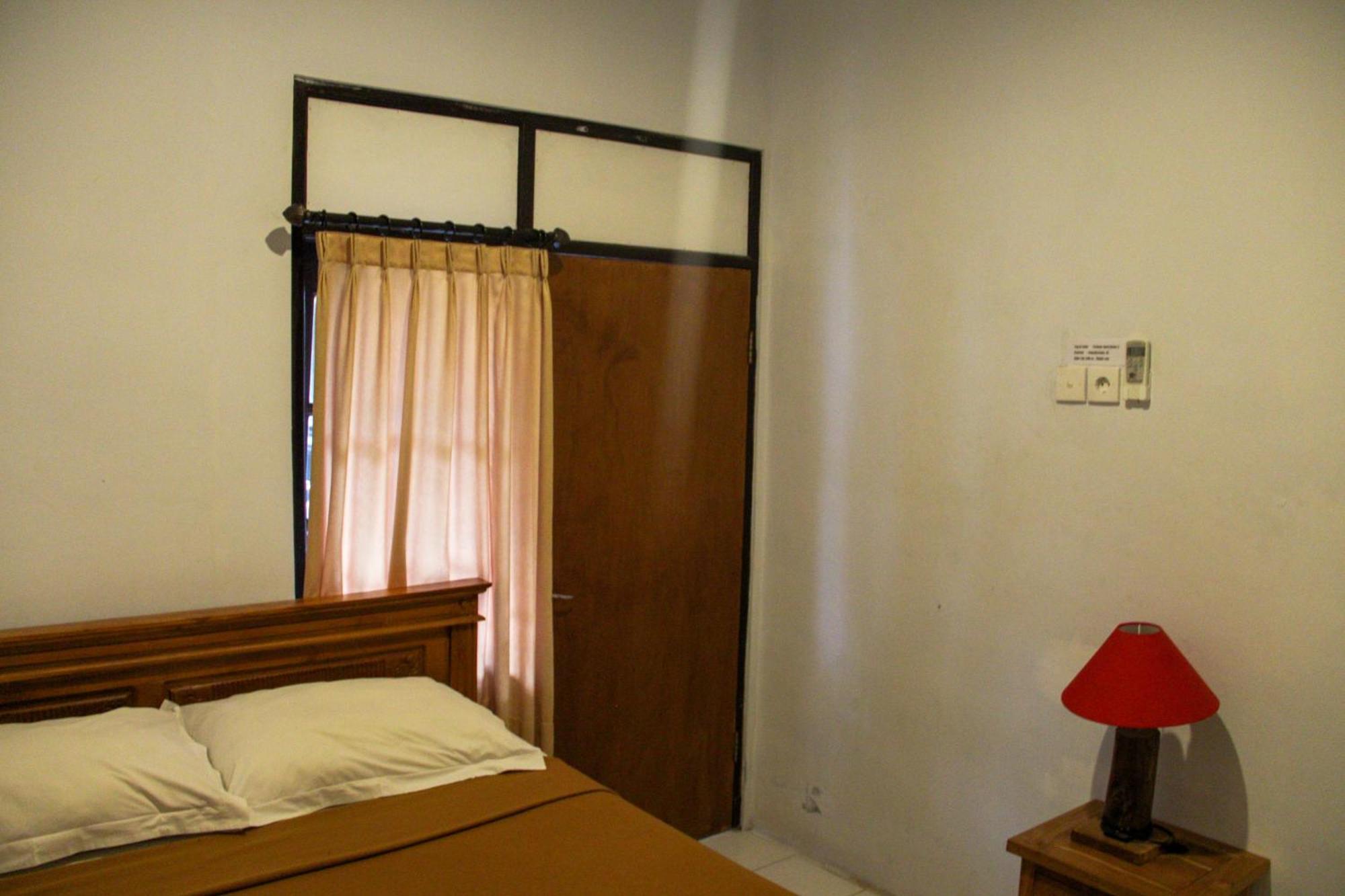 Nyoman Guesthouse Canggu Номер фото